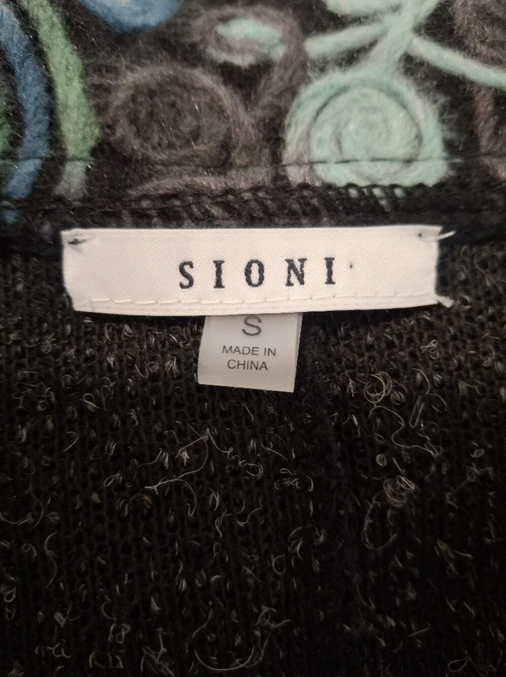 Sioni Black Knit Cardigan with Printed Collar and Cuff Accents